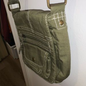 Woman’s army green cross body purse